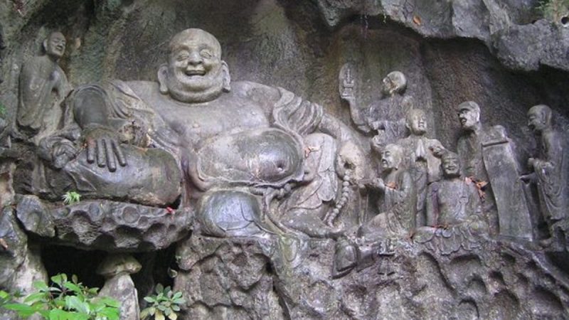 maitreya and disciples carving in feilai feng caves 1 600x398